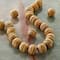 12 Packs: 21 ct. (252 total) Brown & Gold Round Beads by Bead Landing®
